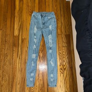 Size 2 light washed ripped jeans